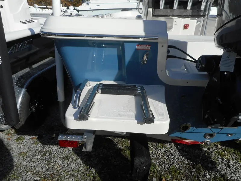 Slide: The Image of 2024 Bulls Bay 2000 boat with a foldable swim ladder on the stern. - 13
