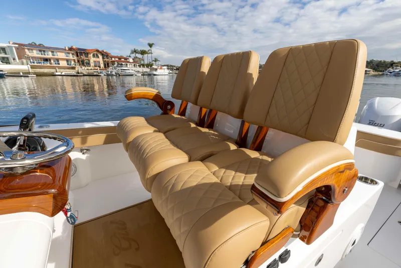 Slide: The Image of 2021 Valhalla Boatworks V37 luxury seating with tan leather upholstery. - 21