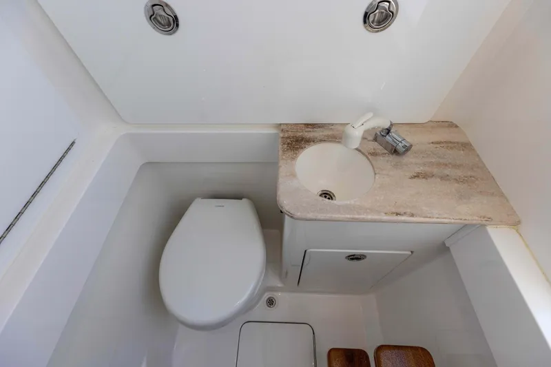 Slide: The Image of 2021 Valhalla Boatworks V37 bathroom with toilet and sink. - 24