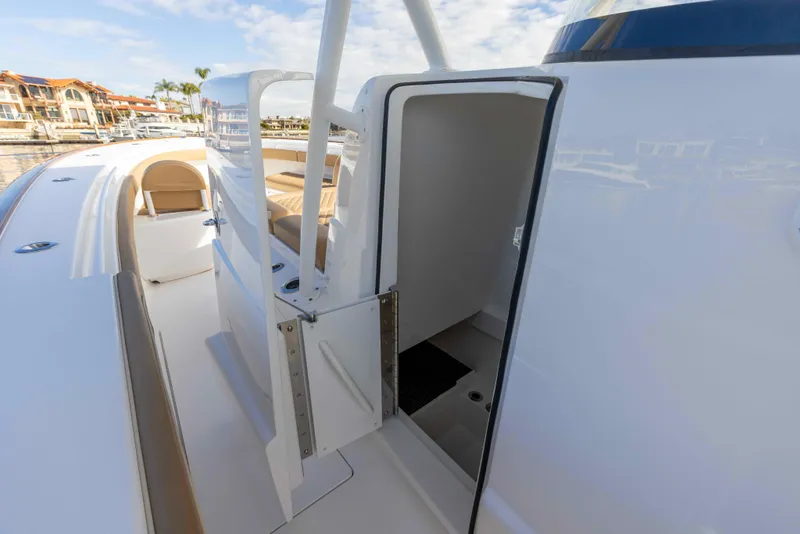 Slide: The Image of 2021 Valhalla Boatworks V37 interior cabin entrance with open door. - 25