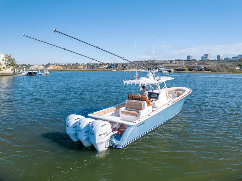 Slide: The Image of 2021 Valhalla Boatworks V37 on water with triple Yamaha outboard engines. - 33