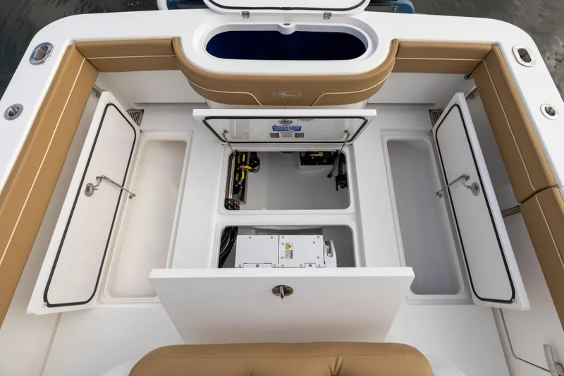 Slide: The Image of 2021 Valhalla Boatworks V37 storage compartments and seating area. - 6