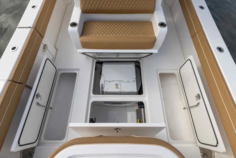 Slide: The Image of 2021 Valhalla Boatworks V37 interior storage compartments and seating area. - 8