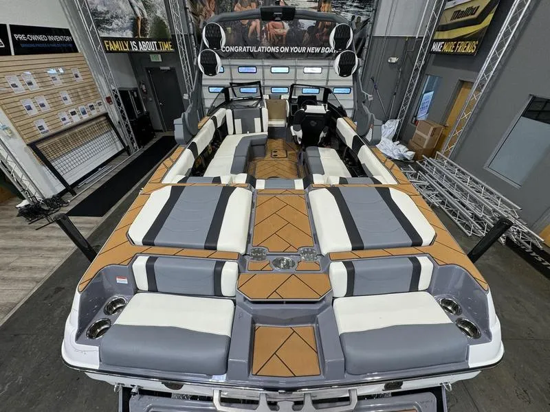 Slide: The Image of 2024 Malibu 23 LSV boat interior with spacious seating and modern design. - 5