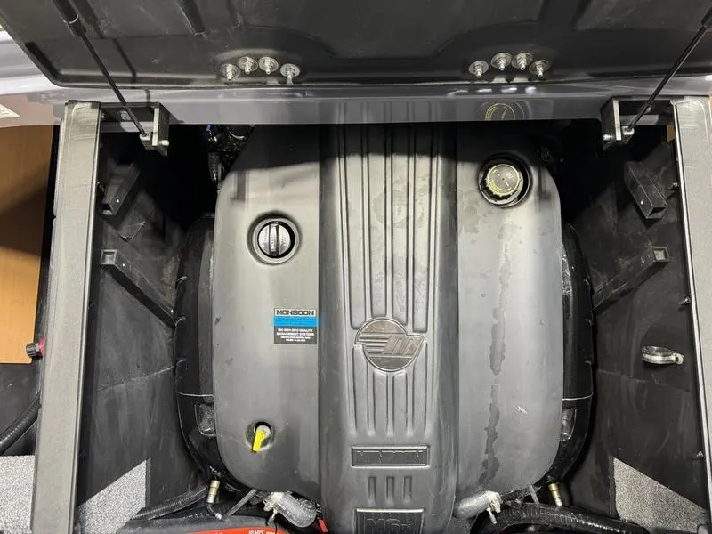 Slide: The Image of 2024 Malibu 23 LSV engine compartment with Indmar Monsoon engine. - 6