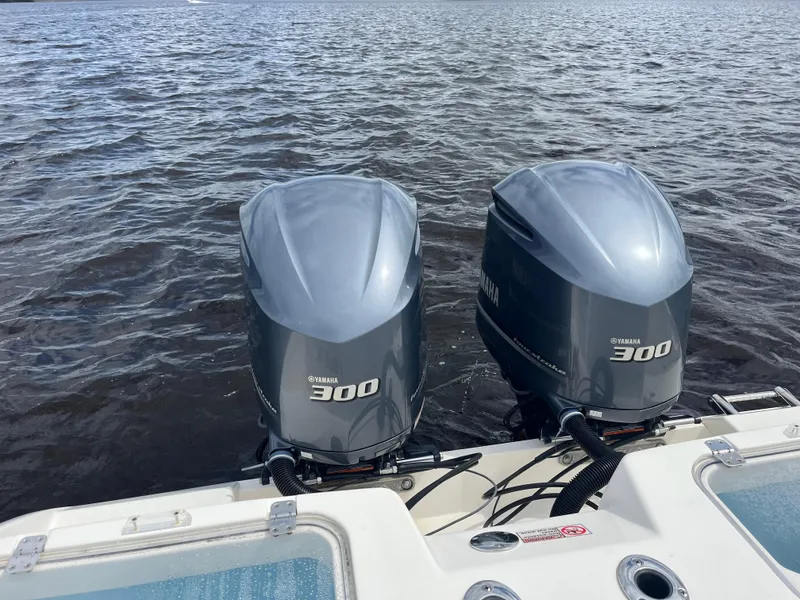 Slide: The Image of Twin Yamaha 300 engines on a 2019 Cobia 320 CC boat. - 40