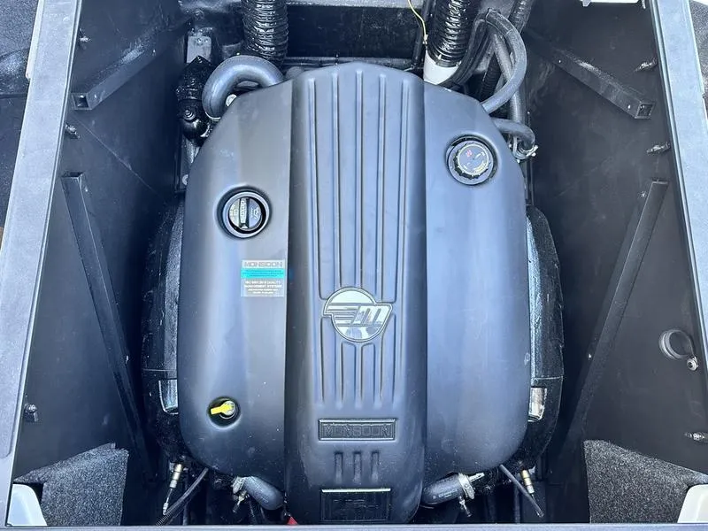 Slide: The Image of 2024 Axis T250 boat engine compartment with Indmar engine. - 17