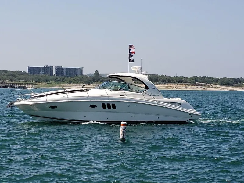 The Image of 2008 Sea Ray 38 Sundancer yacht cruising on open water. - 0