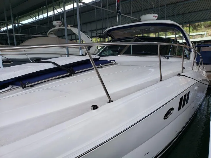 Slide: The Image of 2008 Sea Ray 38 Sundancer yacht docked in a covered marina. - 1