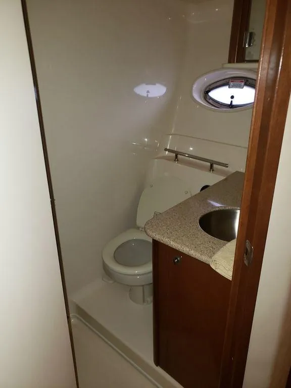 Slide: The Image of 2008 Sea Ray 38 Sundancer bathroom with sink and toilet - 11