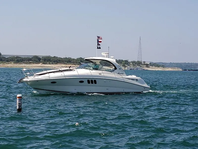 Slide: The Image of 2008 Sea Ray 38 Sundancer yacht cruising on a sunny day. - 13