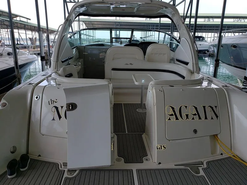 Slide: The Image of 2008 Sea Ray 38 Sundancer yacht docked at marina, rear view. - 49