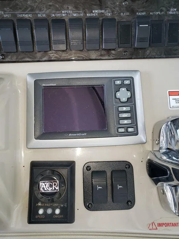 Slide: The Image of Control panel of a 2008 Sea Ray 38 Sundancer boat with SmartCraft display. - 9