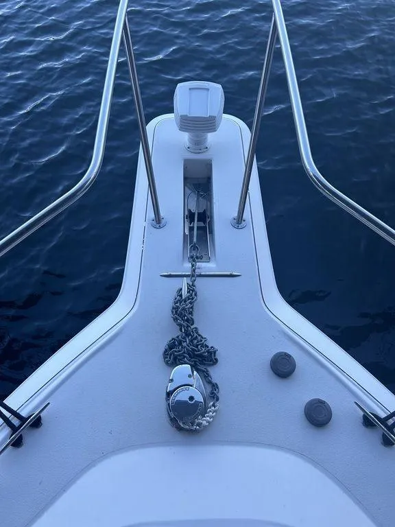 Slide: The Image of Bow of a 1997 Wellcraft 3600 Martinique boat with anchor chain. - 11