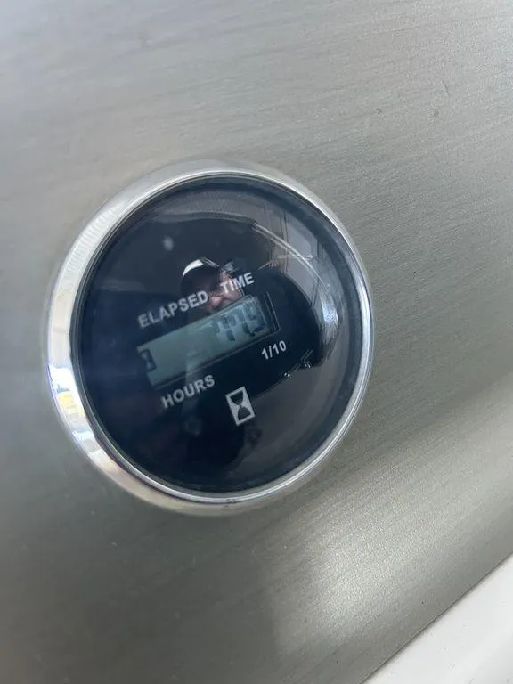 Slide: The Image of Elapsed time meter on a 1997 Wellcraft 3600 Martinique boat. - 13