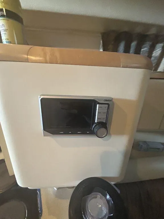 Slide: The Image of 1997 Wellcraft 3600 Martinique cabin interior with control panel. - 22