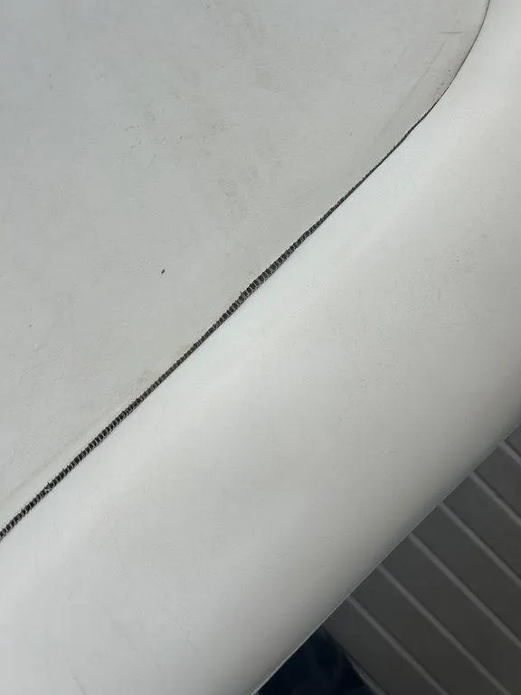 Slide: The Image of Close-up of 1997 Wellcraft 3600 Martinique boat upholstery seam. - 34