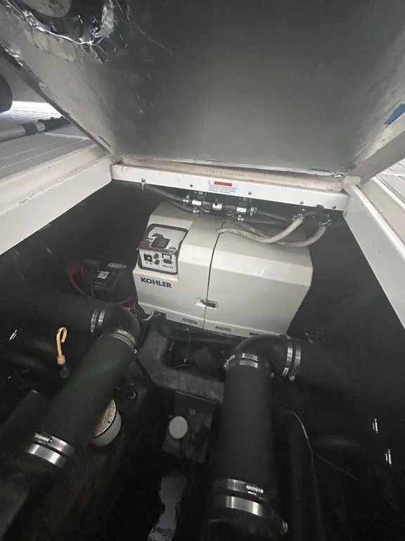 Slide: The Image of 1997 Wellcraft 3600 Martinique engine compartment with Kohler generator. - 37