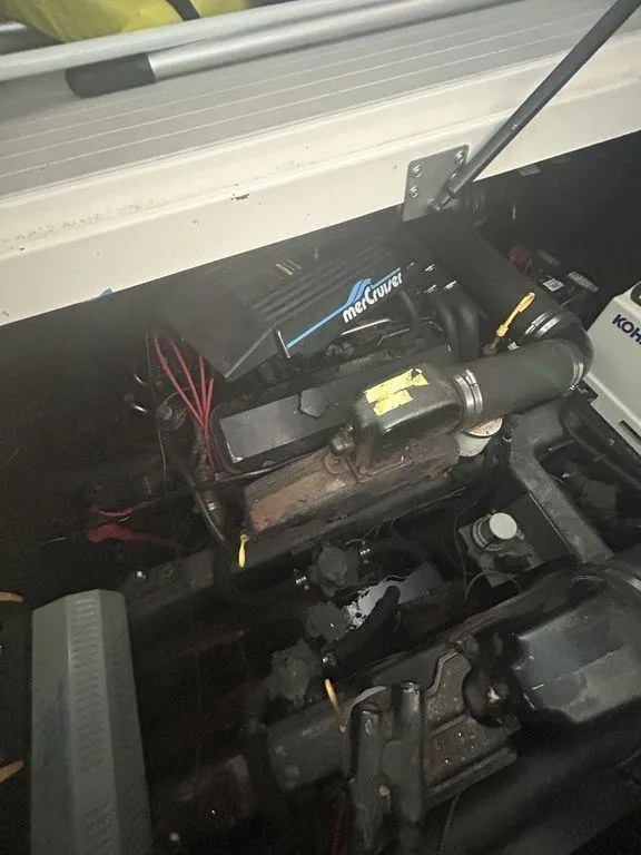 Slide: The Image of 1997 Wellcraft 3600 Martinique engine compartment with MerCruiser engine. - 47