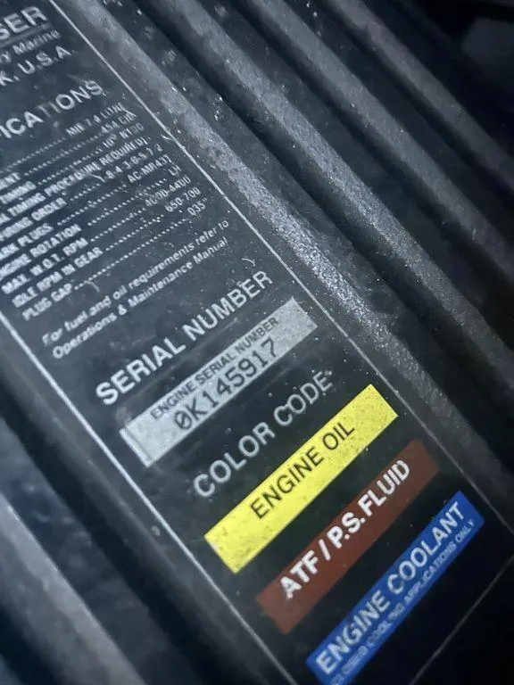 Slide: The Image of 1997 Wellcraft 3600 Martinique engine serial number and fluid labels. - 48