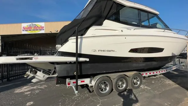 Slide: The Image of 2023 Regal 36 Grande Coupe boat on trailer at South Austin Marine. - 3