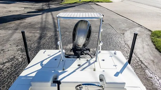 Slide: The Image of 2024 Hewes 16 Redfisher boat with outboard motor, viewed from above. - 11