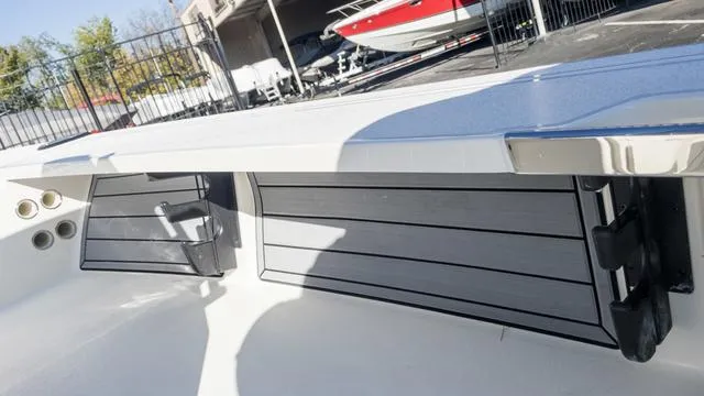 Slide: The Image of 2024 Hewes 16 Redfisher boat interior with storage compartments. - 26