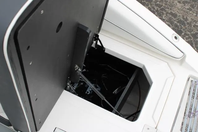 Slide: The Image of 2024 Regal LS6 Surf boat storage compartment detail. - 29