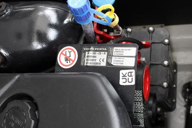 Slide: The Image of Close-up of 2024 Regal LS6 Surf engine with Volvo Penta label. - 39