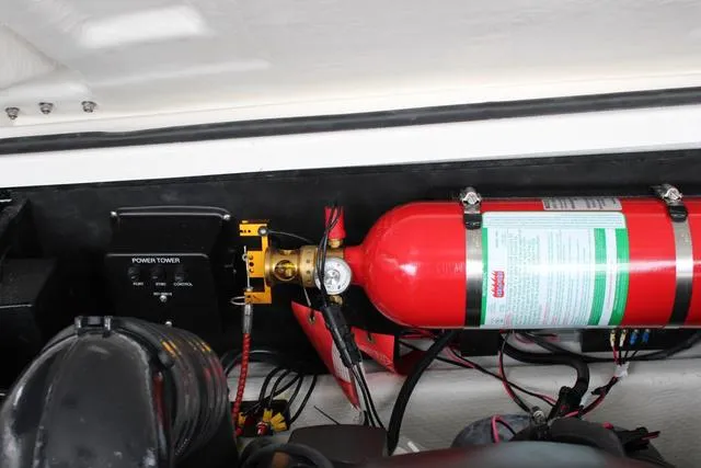 Slide: The Image of 2024 Regal LS6 Surf boat fire extinguisher system in engine compartment. - 40
