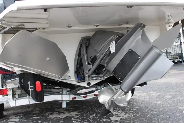 Slide: The Image of 2024 Regal LS6 Surf boat with advanced propulsion system and sleek design. - 8