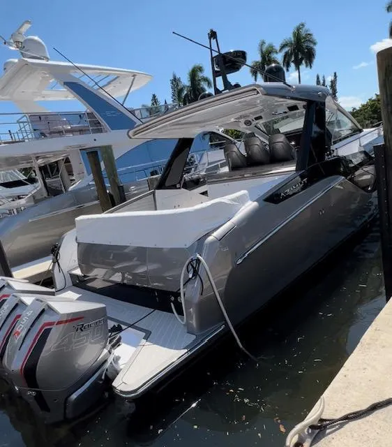 Slide: The Image of 2022 Azimut Verve 47 luxury yacht docked at marina. - 2