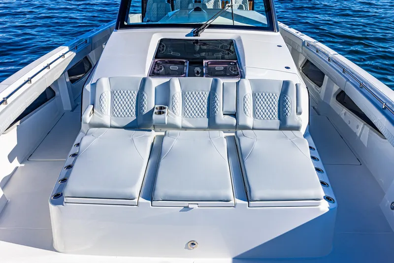 Slide: The Image of 2024 Aquila 47 Molokai boat with luxurious seating on deck. - 26