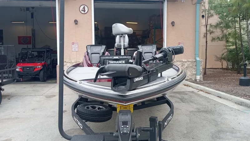 Slide: The Image of 2024 Nitro Z21 XL Pro fishing boat in a garage. - 4