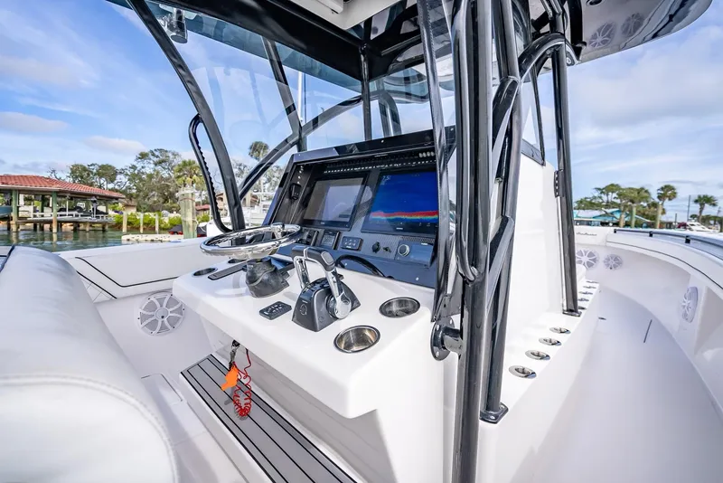 Slide: The Image of 2020 SeaHunter 35 Tournament boat console with advanced navigation and control systems. - 32