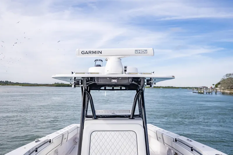 Slide: The Image of 2020 SeaHunter 35 Tournament boat with Garmin radar on calm waters. - 33