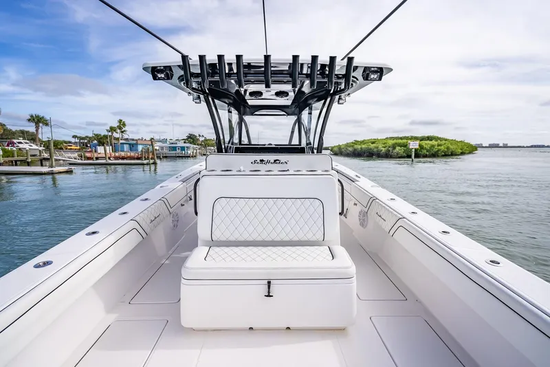 Slide: The Image of 2020 SeaHunter 35 Tournament boat interior with white seating and ocean view. - 48