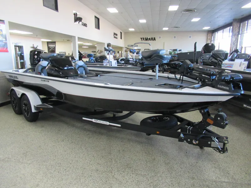 Slide: The Image of 2024 Vexus AVX 1980C fishing boat displayed in showroom. - 1