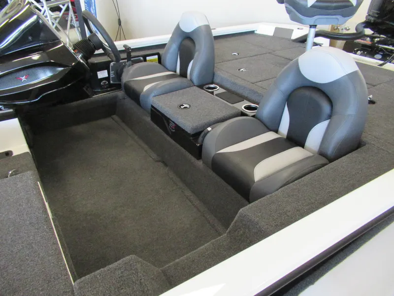 Slide: The Image of 2024 Vexus AVX 1980C boat interior with gray and black seating. - 4