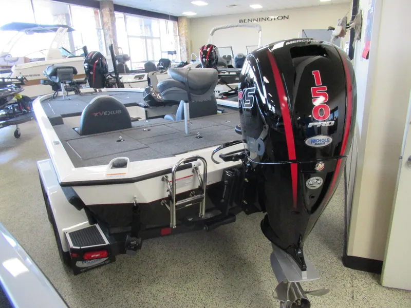Slide: The Image of 2024 Vexus AVX 1980C boat with Mercury 150 outboard motor in showroom. - 6