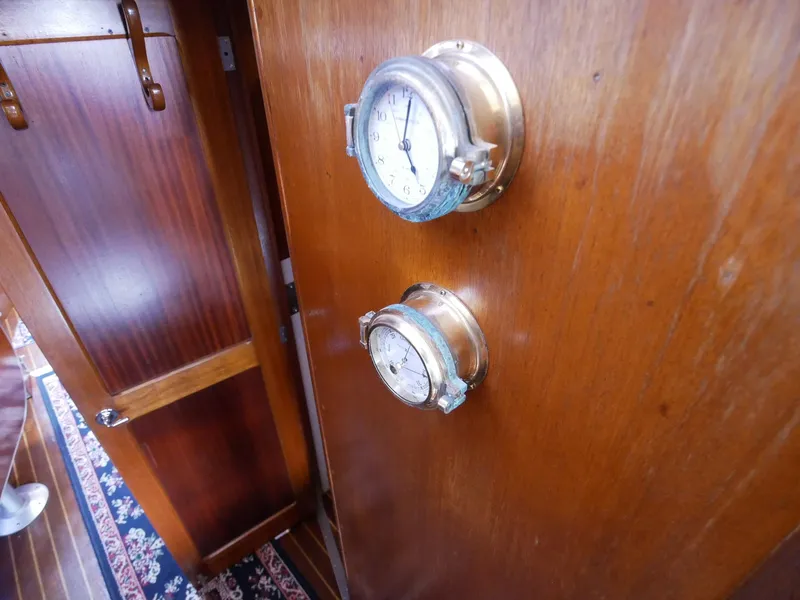 Slide: The Image of 1964 Egg Harbor 37 Convertible Sedan interior with brass instruments. - 14