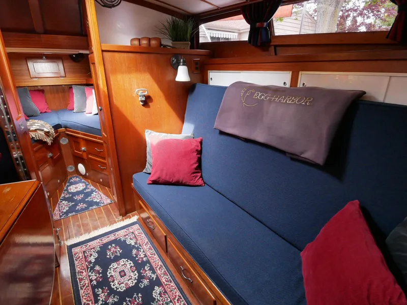 Slide: The Image of Interior of 1964 Egg Harbor 37 Convertible Sedan with cozy seating and elegant decor. - 16