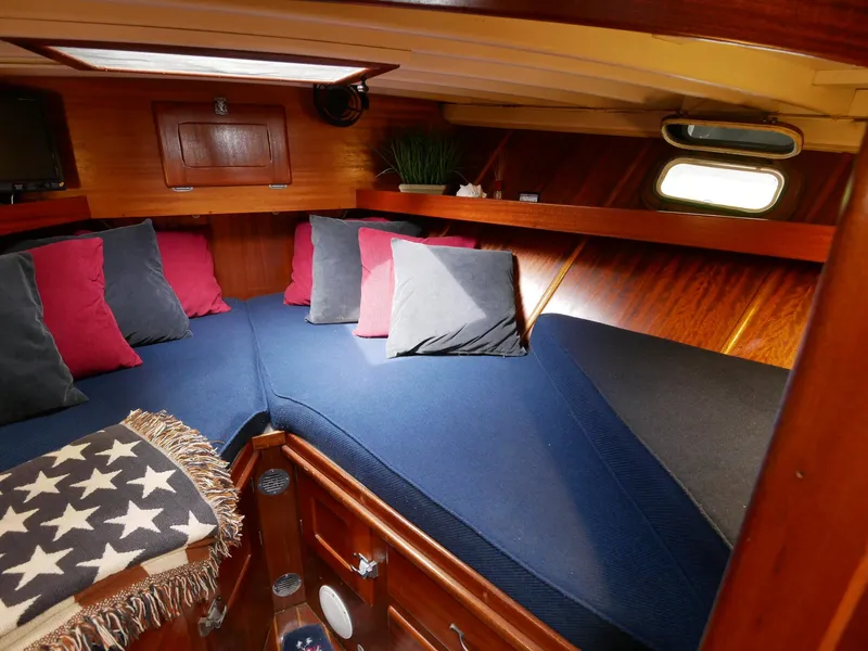 Slide: The Image of Cozy cabin interior of a 1964 Egg Harbor 37 Convertible Sedan boat. - 18