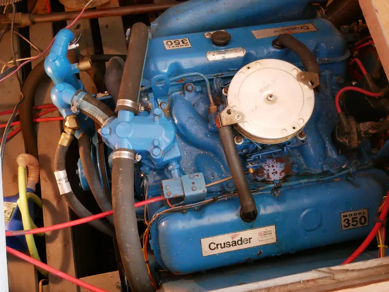 Slide: The Image of 1964 Egg Harbor 37 Convertible Sedan engine, Crusader model 350, blue, in engine compartment. - 46