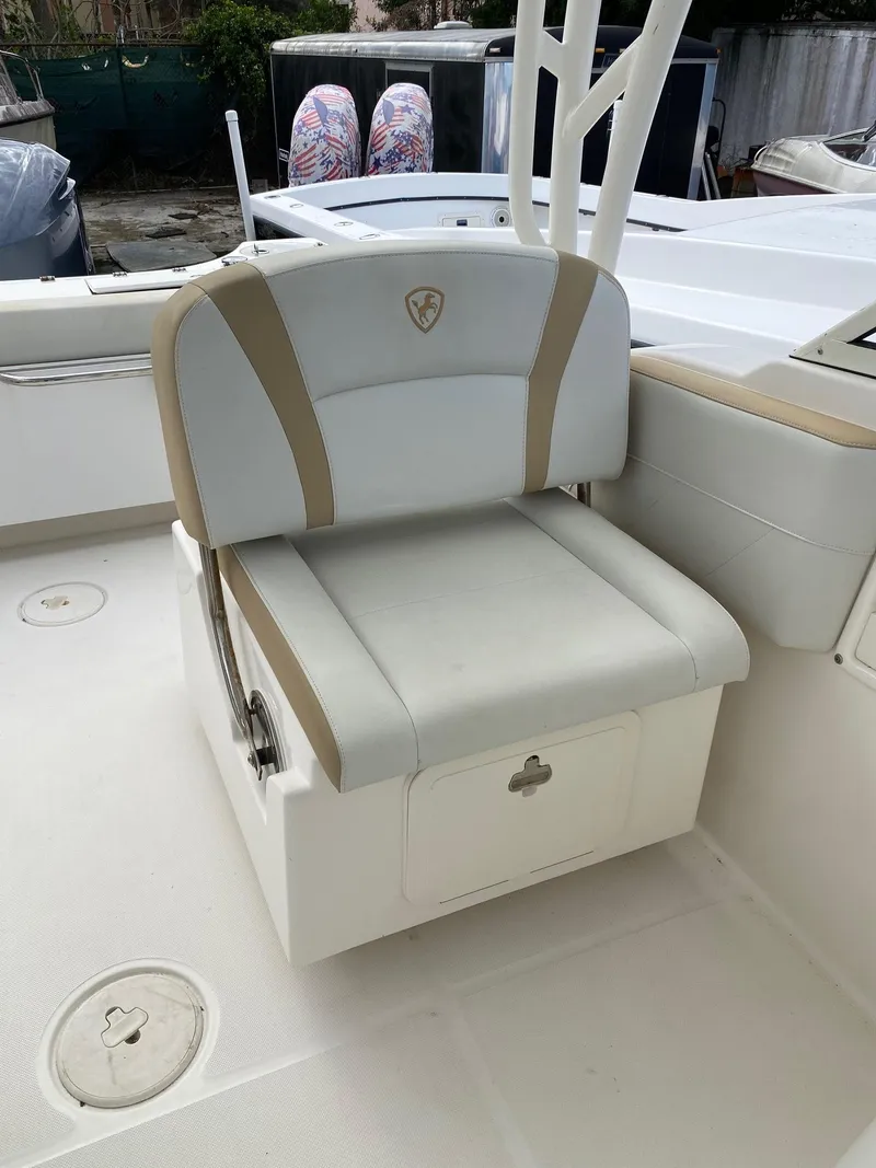Slide: The Image of Century 24 Resorter 2017 boat seat with storage compartment. - 15