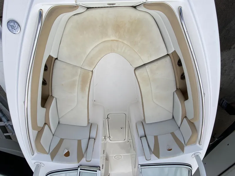 Slide: The Image of 2017 Century 24 Resorter boat interior with beige and white seating. - 17
