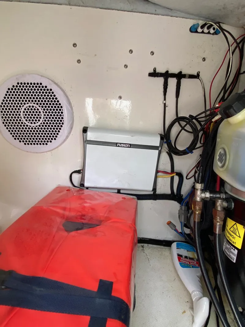 Slide: The Image of Interior of a 2017 Century 24 Resorter boat showing wiring and equipment. - 21