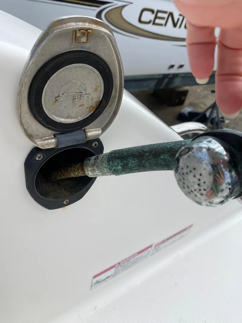 Slide: The Image of Close-up of a 2017 Century 24 Resorter fuel filler cap and hose. - 32