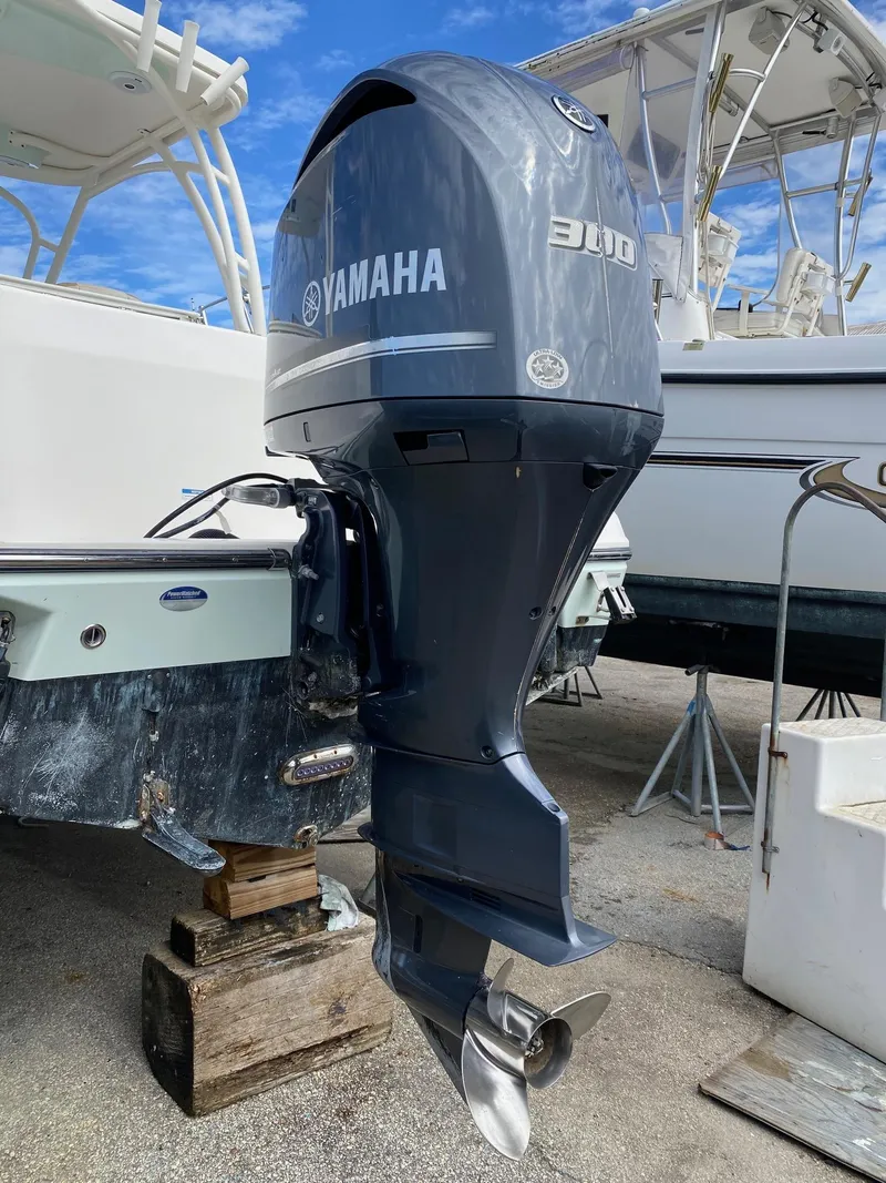 Slide: The Image of Yamaha 300 outboard motor on a 2017 Century 24 Resorter boat. - 38