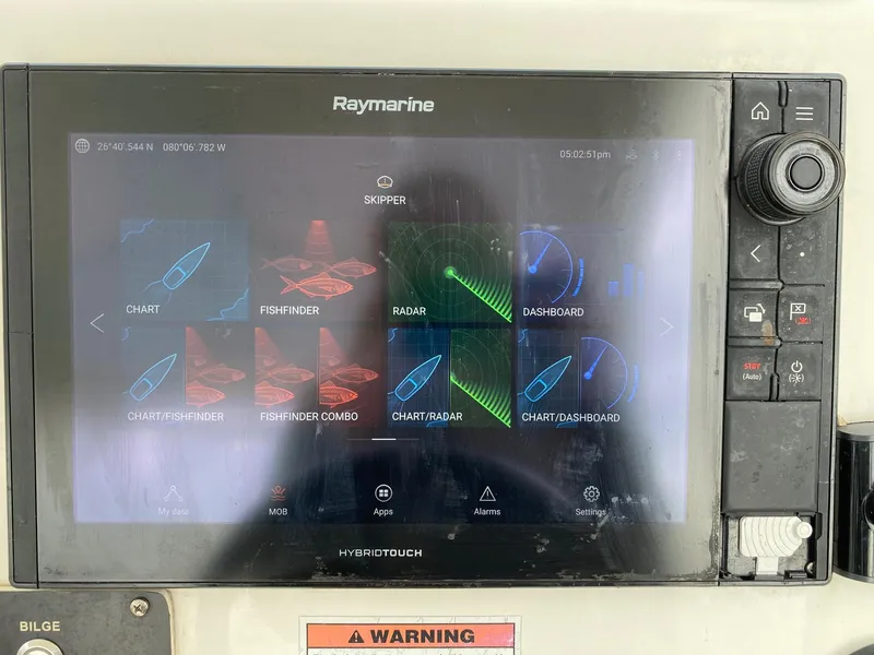 Slide: The Image of Raymarine HybridTouch display on 2017 Century 24 Resorter boat showing navigation and radar. - 9